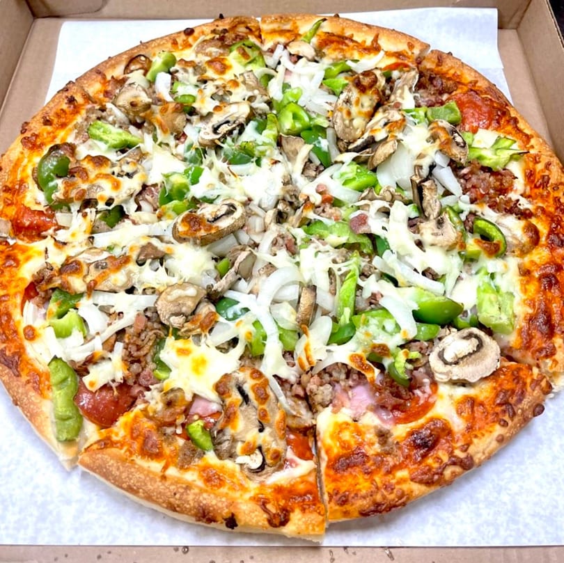 Family Style Pizza's supreme pizza, loaded with pepperoni, sausage, mushrooms, onions, and green peppers.
